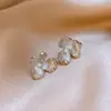 Puesto de área de remate suministro de aretes luz de lujo alta sensación descuento especial aretes para recoger fabricantes al por mayor huérfanos