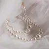 Amazon Transfronterizo Moda Elegante Conjunto de Collar y Pendientes de Perlas de Imitación para Mujer Francés Nicho Conjunto de Joyería de Alta Gama