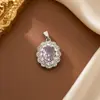 Colgante vintage de circón color rubí para mujer, colgante de collar de flor de diamantes completos, accesorio de cadena para clavícula de lujo ligero de alta gama