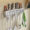 Venta al por mayor de fábrica estante de cocina simple soporte para cuchillos de cocina de acero inoxidable estante de especias para el hogar negro estante de especias sin perforación