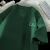 Llegada Nueva Verano 2025 Camiseta Holgada de Manga Corta para Hombre Estilo Hong Kong Algodón Puro Marca de Moda Estampado de Coche Cuello Redondo Hombro Mangas de Media Longitud