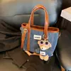 Bolso de Mano Versátil Casual Estilo Coreano Bolso Cubo para Mujer Verano 2025 Mezclilla Moderno Bolso de Hombro Cruzado de Gama Alta
