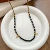 Otoño e Invierno Nueva Cadena de Suéter de Piedra Ojo de Tigre Retro Francesa Lujo Accesible Diseño de Nicho de Gama Alta Accesorios Largos con Perlas