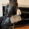Bolso de mano grande de estilo coreano simple, nuevo modelo 2026, bolso versátil para mujer, adecuado para ir al trabajo, bolso de hombro y de mano para otoño