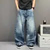 Silueta urbana casual, efecto de bigote lavado, jeans de corte curvo holgados, nuevos pantalones anchos relajados estilo americano para hombre y mujer