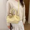 Bolsa de Mão de Nicho Transfronteiriça para Mulheres Nova Tendência da Moda Primavera 2026 Pequena Bolsa Tote Versátil Bolsa de Ombro Transversal