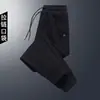 Pantalones de terciopelo al por mayor directos pantalones casuales para hombre otoño e invierno punta deportiva cremallera ropa exterior deportiva pantalones cálidos