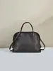 Bolso Nuevo Modelo 2026 con Forma de Concha Negra Hecho de Piel de Vaca de Primera Capa, Bolso de Mano y Bolso Cruzado, Bolso de Hombro Simple y Versátil para el Viaje Diario