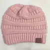 2017 Más vendido Otoño e Invierno Europeo y Americano ebay Amazon Etiquetado CC Gorro de punto de lana liso para la cabeza Gorro para la cabeza con cola de caballo para exteriores
