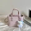 Bolso pequeño para mujer 2026 modelo nuevo primavera-verano, textura de alta calidad, diseño de nicho, bolso bandolera versátil vintage, bolso de mano tipo cubo
