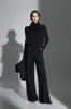 Chaleco de punto suelto adelgazante con cuello alto apilado estilo francés y pantalones rectos de pierna ancha para otoño-invierno, modelo nuevo de nicho 2026