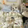 Set de Ropa de Cama para Bebé de Grado A Algodón Puro Cuatro Piezas Estilo Fresco Ins Algodón Lavado Dibujos Animados Lindos Estilo Crema Sábana Funda de Edredón