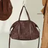 Bolsa feminina em couro legítimo 2026 novo modelo bolsa de mão camurça transfronteiriça bolsa transversal estilosa vintage bolsa de ombro para o dia a dia