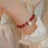 Pulsera de Mariposa con Cuentas Redondas Rojas para Mujer, Diseño de Nicho, Versátil, de Alta Gama, Elegante, Pulsera Retro, Lujo Ligero, Joyería Simple para la Mano