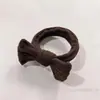 Libro rojo pequeño de Corea del Sur con simple anillo para el pelo de intestino grueso tocado para mujer 2024 nuevo anillo para el pelo de tela de alta elasticidad venta al por mayor