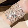 Pulsera de flor de circonita y nácar chapada en oro real de 18k, pulsera de estilo coreano ins de alta gama, joyería versátil de lujo ligero para mujer