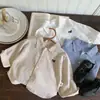 Camisa de otoño para niño 2026 nuevo estilo camisa de algodón puro para primavera y otoño niños 2-3 años top de otoño moderno para niño