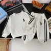 Conjunto de sudadera con media cremallera para niños y niñas, estilo nuevo para primavera y otoño, bloques de color, casual, elegante, holgado, conjunto de dos piezas bordado