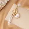 Estilo Celebridade da Internet Europeia e Americana Colar em Forma de Coração de Pérola Artificial Colar com Fecho Ot Conjunto de Pulseira, Luxo Leve, Elegante, Design de Nicho