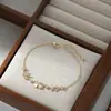 Joia de Mão Personalizada com Zircônias Estilo Novo 2026 para Mulheres, Pulseira Ajustável de Puxar de Alto Padrão com Pedra Olho de Gato e Laço