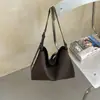 Bolsa de ombro tecida de alta qualidade estilo francês, simples, fashion, casual, bolsa de mão moderna, bolsa de bolinho com design de nicho
