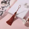 Nuevos accesorios de marcapáginas de borla de bola de tornillo de hilo largo, suministros hechos a mano de nudo chino, venta al por mayor del fabricante