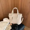 Bolso Cubo con Textura Tejida en Relieve para Mujer 2026 Nueva Versión Coreana Bolso de Mano Simple y Moderno Bolso Cruzado de Moda para el Trabajo