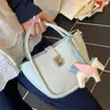 Bolso Cubo para Mujer con Acabado de Alta Gama, Bolso de Mano Transfronterizo de Moda con Patrón de Lichi, Nuevo Bolso Cruzado Estilo Cesta Elegante 2026