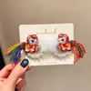 Diadema de Saludos de Año Nuevo para Niños Pasador Rojo con Lazo para Bebé Bola de Pelo con Borla Estilo Chino para Niñas