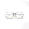 Atacado F6005 ultra-leve moda retro semi-titânio moldura de titânio puro almofada de nariz de duas cores chapeamento IP resistente à cor