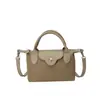 Bolsa de Dumpling Francesa Nueva de Verano Retro Bolso Cruzado Simple Ligero Bolso Pequeño Textura Suave Bolso para Teléfono Bolso Cuadrado Pequeño