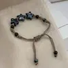 Diseño de Nicho Estilo Chino Nuevo Pulsera de Cerámica Negra Tejida con Estrellas para Mujer Cuerda de Mano Tejida a Mano con Cuentas Ajustable Venta al por Mayor