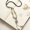 Joyería de cerámica collar largo cadena para suéter estilo étnico estudiante femenina mariposa colgante estilo antiguo bajo precio suministro