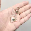 SHEIN TEMU Chaveiro Explosivo Peixe Dourado Transparente Peixinho Chaveiro de Resina Pingente de Joia Acessórios
