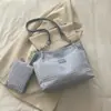 Bolso de mujer 2026 moda nuevo bolso tote de gran capacidad bolso de hombro de cadena versátil para estudiantes universitarios y uso diario