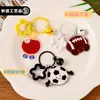 Colgantes creativos de bola de dibujos animados, llaveros de tenis de mesa y fútbol, accesorios versátiles para bolsos de niñas, venta al por mayor decorativa