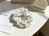 Goma para el pelo de chifón floral fresca y dulce para mujer, Goma de satén con forma de corazón para coleta, Venta al por mayor de accesorios, Al por mayor en stock