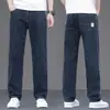 Jeans de seda gelada de alta qualidade para homens, novo estilo de outono, corte reto solto, novo modelo 2026, calças compridas casuais para meia-idade Xintang