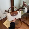 Bolsa Transversal Trançada Versátil e Moderna para Mulheres, Bolsa de Palha, Bolsa de Ombro Estilo Casual, Nova Bolsa de Mão Color-Blocking Estilo Coreano 2026