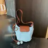Bolsa de Ombro/Axila Feminina Versátil Elegante de Grande Capacidade Transfronteiriça Nova de Verão 2026 Bolsa Transversal Tipo Balde para o Dia a Dia