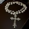 Collar con cadena de serpiente de perlas de estilo sencillo y ajustable con cuentas redondas, elegante cadena de clavícula de celebridades de Internet, collar de lujo ligero y moderno para mujer.