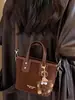 Shuai Mijia 2026 Outono Nova Bolsa Transversal Elegante e da Moda de Ombro Único com Textura Retrô, Bolsa de Mão Tipo Saco Feminina