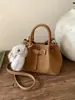 Bolso de Mano de Aspecto Elegante Estilo Coreano para Mujer Invierno 2026 Nuevo Estilo Coreano Retro Gamuza Gran Capacidad Bolso Cubo
