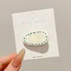 Pinzas laterales estilo dopamina con un toque de alta gama, pinzas delicadas con flecos para niñas, pasadores dulces, pinzas de cocodrilo a la moda