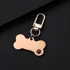 Etiqueta de corte de acero inoxidable más vendida transfronteriza con una pequeña hebilla de puerta, personalizable con grabado, colgante creativo, charm para mochila, pequeño regalo