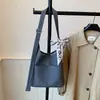 2026 Nova Bolsa de Ombro Único Estilo Coreano Nicho Bolsa de Axila com Laço Feminina Bolsa Tote Versátil da Moda para o Trabalho Grande Capacidade