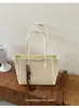 Bolso de mano tejido retro de nicho de moda estilo francés para mujer, nuevo modelo 2026, bolso de hombro y axila de gran capacidad para el día a día