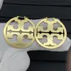 Nuevos Pendientes Brillantes Calados de Tb para Mujer, Diseño de Nicho con un Toque de Lujo, Pendientes de Lujo Ligero, Accesorios de Moda Transfronterizos Europeos y Americanos