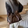 Bolsa de mano transfronteriza, bolsa plisada de cuero suave, bolso de hombro popular estilo coreano, bolso de hombro de moda de nicho, bolso de axila para el trabajo