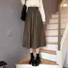 Falda de longitud media de piel sintética para mujer, nueva colección otoño/invierno 2026, de cintura alta, adelgazante, línea A, casual y que se ajusta a la figura